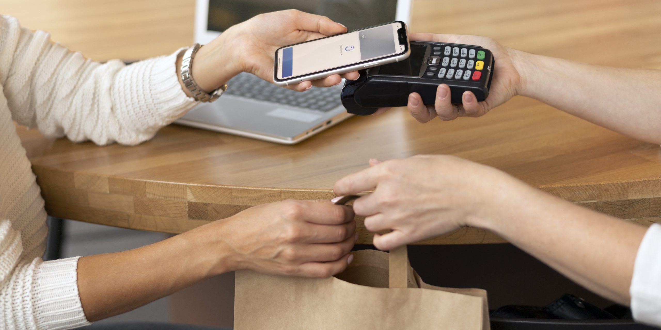 person-paying-with-its-smartphone-wallet-app