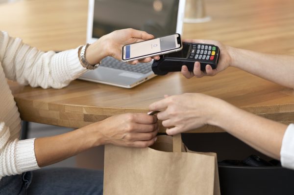 person-paying-with-its-smartphone-wallet-app